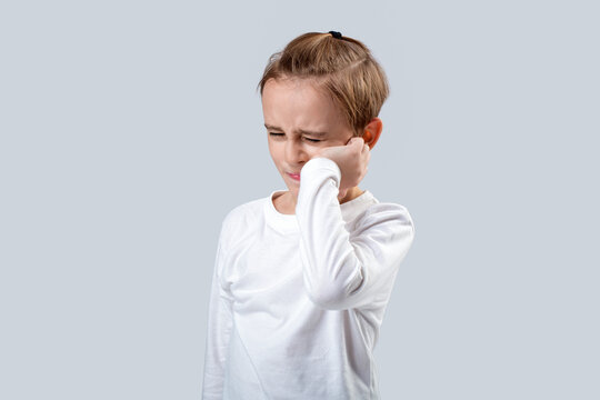 Dental disease. Toothache as dental pain. Anti toothache remedy. Cute little boy with dental problem, having lot of pain. Little child suffer from toothache gray background. Toothache painkiller