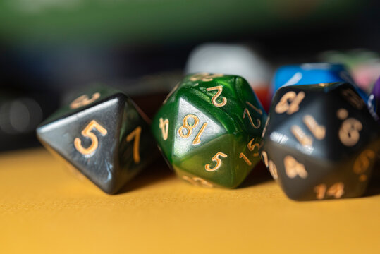 Detailed shot of custom polyhedral dice for tabletop RPG games The Concept of fantasy and gaming hobby