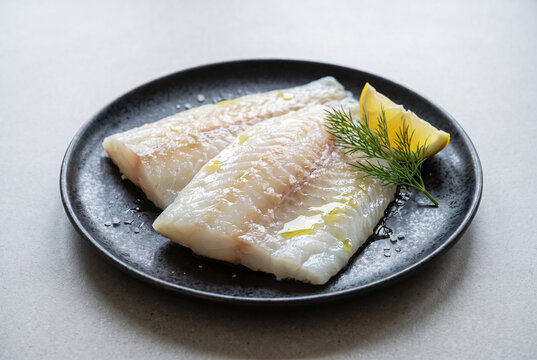 Fresh Raw Cod Fillets with Lemon and Dill
