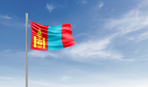 Mongolia national flag waving in the sky.