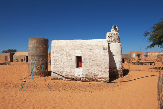 Ancient mosque in the small village in Sahara desert, Mauritania,