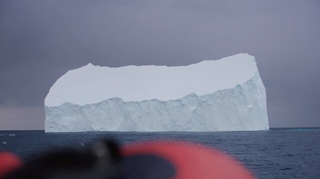 Massive tabular iceberg seen from expedition ship