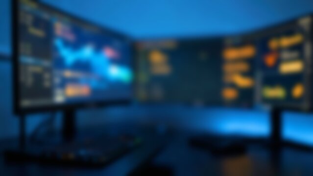 Blurred Modern Multi Monitor Tech Workspace for AI Software