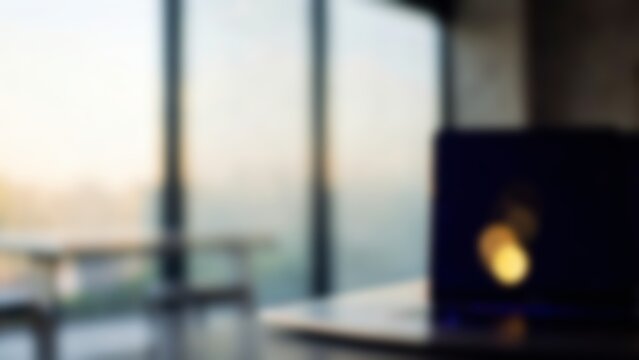 Blurred modern workspace background with laptop for fintech website