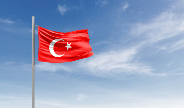 Turkey national flag waving in the sky.