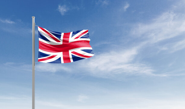 United Kingdom national flag waving in the sky.