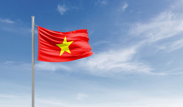 Vietnam national flag waving in the sky.