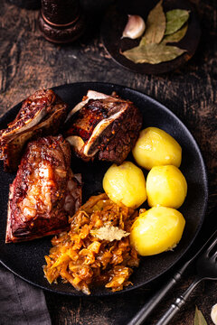 Grilled ribs with sauerkraut and potatoes