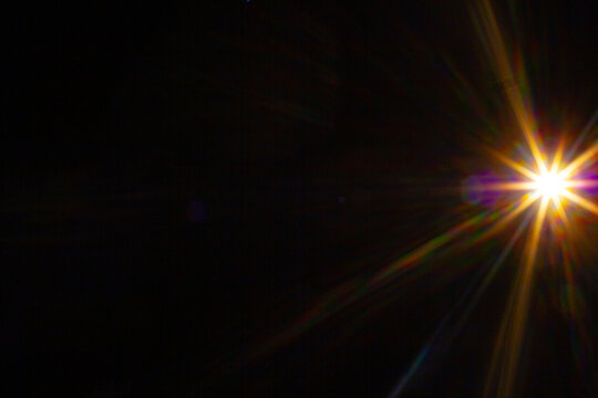 Sun flare on the black background