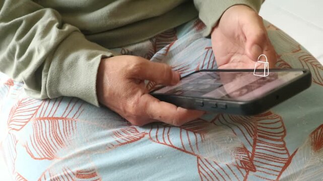 Close up of a person using a smartphone while sitting comfortably at home.