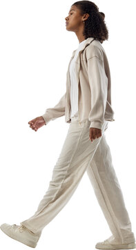 Teenage girl walking left in profile isolated on transparent background. Concept of youth independence, editorial page design, directional advertising layouts.
