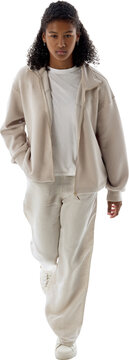 Black teenage girl walking toward camera with hands in pockets isolated on transparent background. Concept of casual confidence, streetwear marketing, young consumer lifestyle.