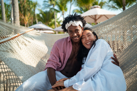 Couple enjoying their tropical vacation with peace of mind, secured by reliable travel insurance