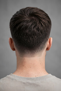 Rear View of Young Man with Modern Short Haircut