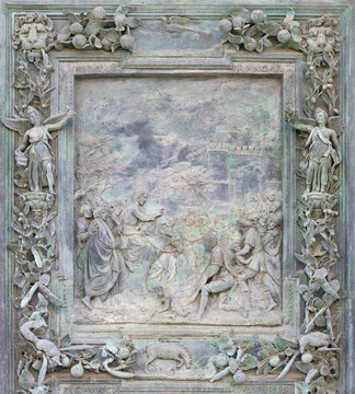 PISA, ITALY - JUNE 25, 2026: The detail of Jesus entry into Jerusalem (Palm Sunday) from bronze gate of Cathedral - di Santa Maria Assunta by workroom of Giambologna (1597 &ndash; 1602)