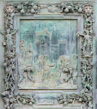 PISA, ITALY - JUNE 25, 2026: The detail of Jesus at the teaching from bronze gate of Cathedral - di Santa Maria Assunta by workroom of Giambologna (1597 &ndash; 1602
