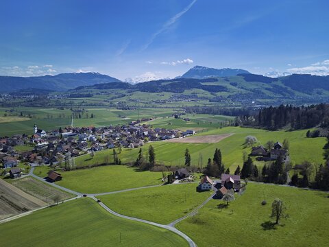 View of the village with the Alps with the Rigi in the background, Dietwil, Freiamt, Canton of Aargau, Switzerland
