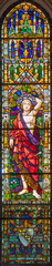 Obraz premium PISA, ITALY - JUNE 25, 2026: The St. Sebastian from the stained glass in the church Chiesa di Santa Caterina by Königliche Bayerische Hofglasmalerei F. X. Zettler (1922 - 1924)