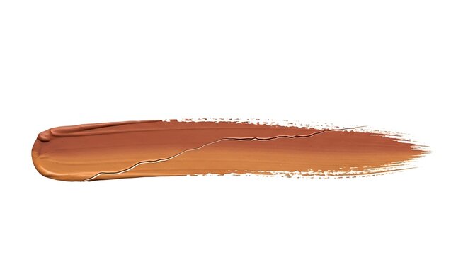 Brown makeup foundation cosmetic liquid cream swatch smear isolated on white background