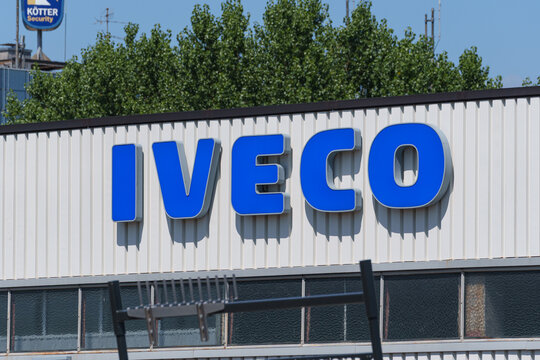 Dusseldorf, Germany - July 21 2026: IVECO logo displayed on a dealership building facade in D&uuml;sseldorf, Germany