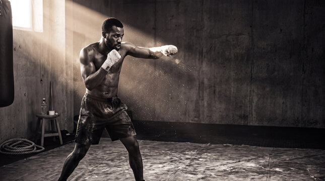 Boxer shadowboxing in a minimal gym