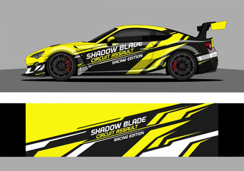 Fototapeta premium Yellow racing car with bold circuit assault decal design