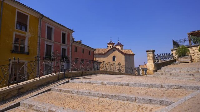Stone steps and elevated walkway in the medieval old town of Cuenca Spain
