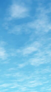 Vertical seamless loop clear blue sky with softly moving white clouds