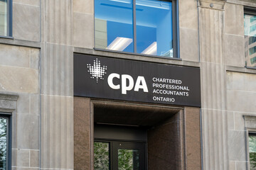 Fototapeta premium Toronto, Canada - August 5, 2026: Close up of CPA Ontario sign on the building in Toronto, Canada. Chartered Professional Accountants of Canada (CPA Canada) is a national accounting organizations. 