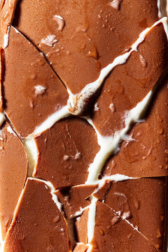 Macro Close Up of Cracked Chocolate Ice Cream Shell Texture
