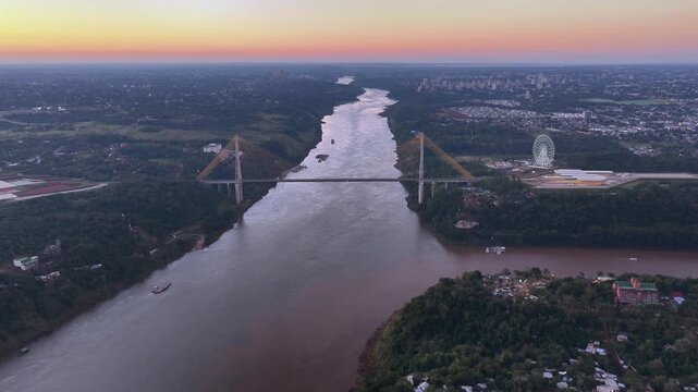 Flying Forward Along the Paran&aacute; River Between Ciudad del Este and Foz do Igua&ccedil;u at Dusk