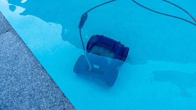 Robotic Pool Cleaner Cleaning Swimming Pool Underwater Close Up