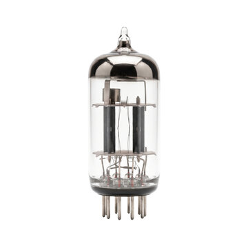Vintage vacuum tube with metal pins and glass enclosure on a white background