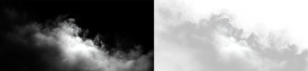 Fototapeta premium Clouds in a clear sky with sunlight peeking through the gray formations