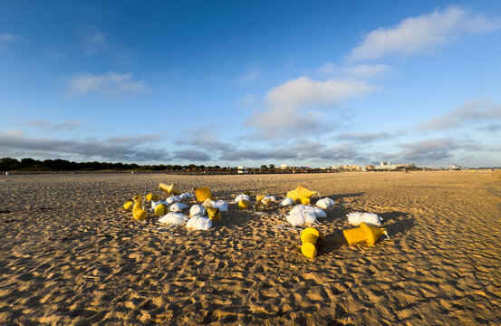 buoys with weights on the ocean shore
