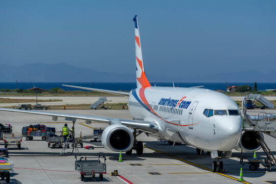 A Smartwings plane prepares for takeoff at Rhodes airport on a sunny day