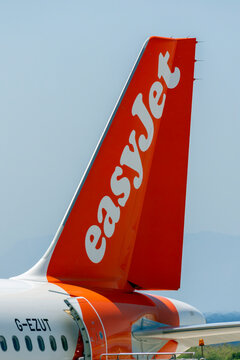 An easyjet plane prepares for takeoff at Rhodes airport on a sunny day