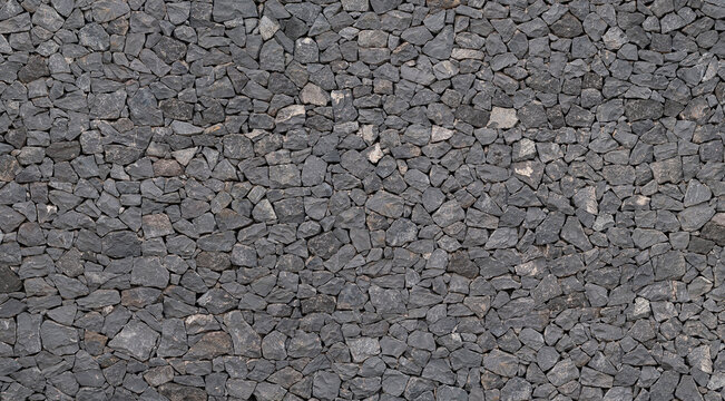 Volcanic stone wall texture from Tenerife, black lava rock background