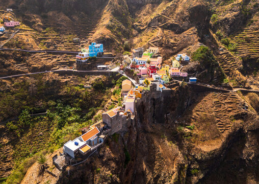 Aerial view of Fontainhas village with colorful houses and terraced fields on a steep cliffside in Ribeira Grande, Ribeira Grande, Cabo Verde.