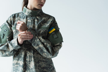 Obraz premium Young woman proudly wearing military uniform in celebration of Ukraine Independence Day