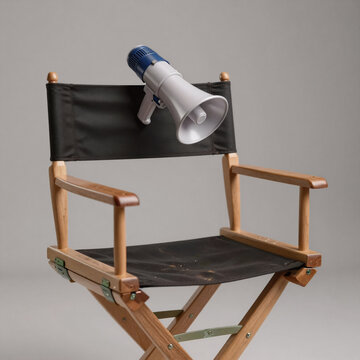 Stop-Motion Megaphone Direction. Back View Of A Film Director'S Chair With A Megaphone Emblem