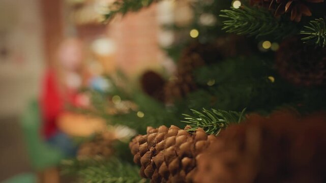 Pine cone closeup, cafe light bokeh white woman in red sweater blurred in background writer flipping pages at corner table, macro texture and warm glow from holiday lights, intimate seasonal mood