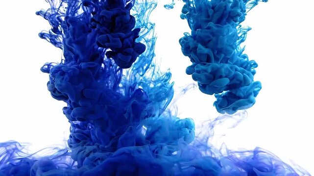 Blue ink swirling in clear water. Abstract liquid cloud dispersion and mixing effect. Underwater smoke pattern background for creative design and visual art project.