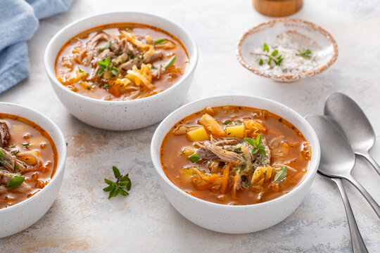 Cabbage and pork soup or stew with potatoes