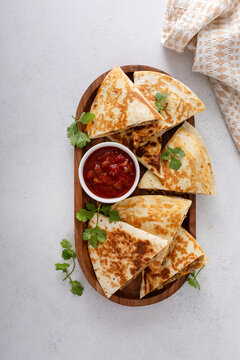 Ground beef and cheese quesadillas on a serving plate