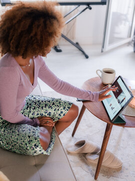 Woman shopping online on tablet computer 