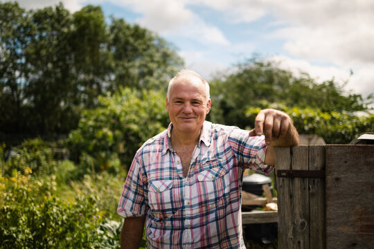 A proud gardener's portrait