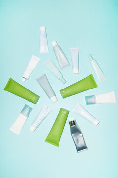 Blue turquoise colour mockup skincare beauty product tubes with space