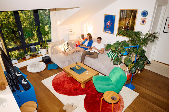 Man and woman are relaxing at home in the afternoon.