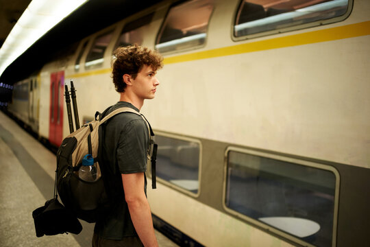 Waiting for the Train at a Subway Station in the Evening